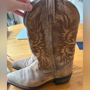 Brown leather cowboy boots